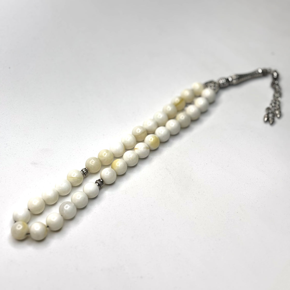 The Mother of Pearl Tasbih (33 Beads) –